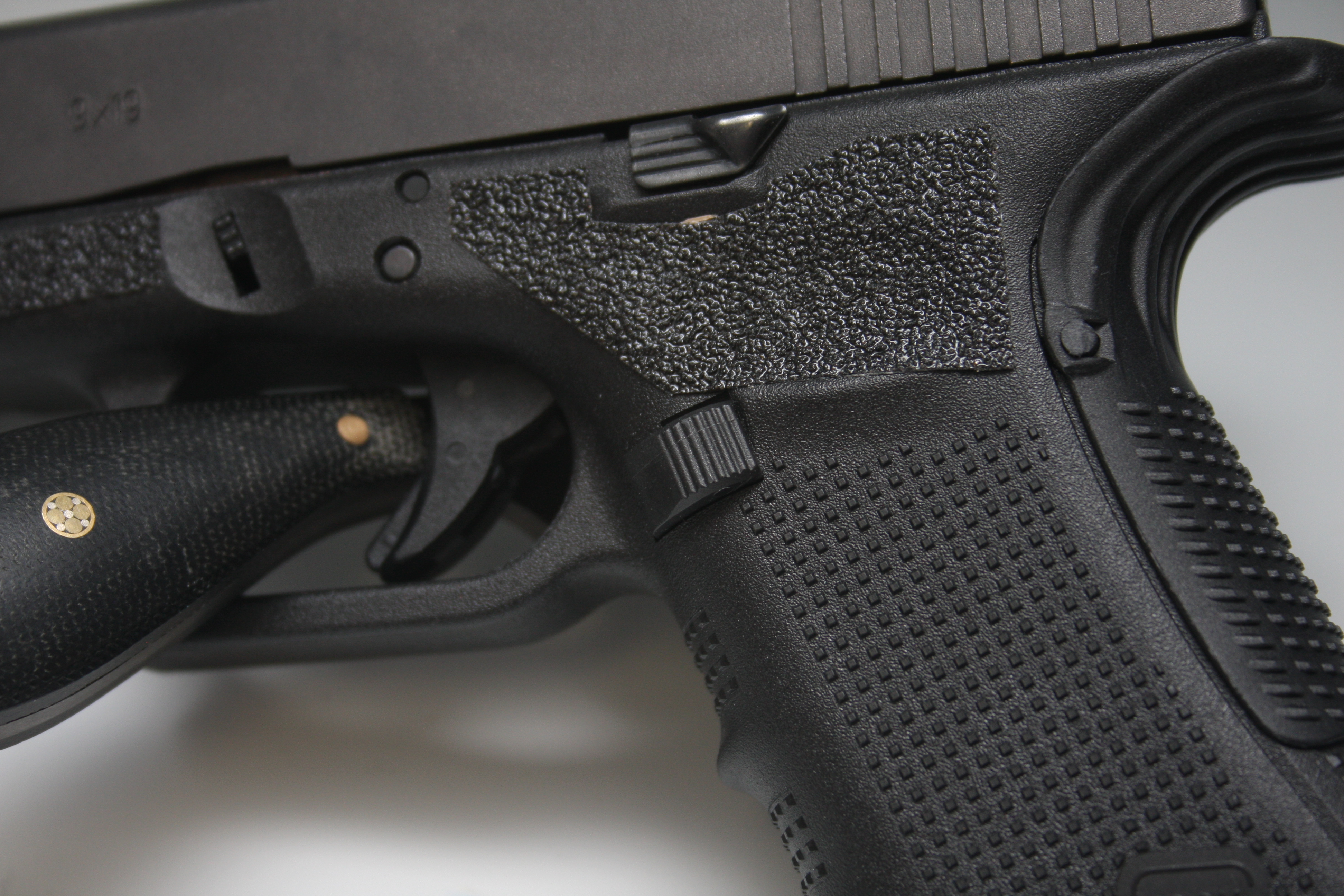 The Tango Down magazine release and the Glock extended slide release make reloading the Glock at speed a little bit easier.