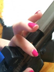 Now I'm a liar because I press-checked my M&P for this terrible photo. Also, I know my nails are chipped, sorry about that moment of weakness.