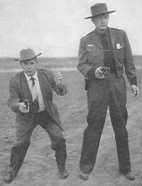"Jelly" Bryce of FBI fame and Bill Jordan demonstrate their point shooting techniques.