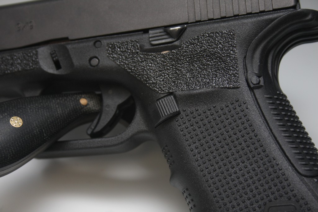 The Tango Down magazine release and the Glock extended slide release make reloading the Glock at speed a little bit easier.