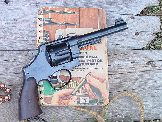1917_Smith_and_Wesson_with_Speer_reloading_handbook