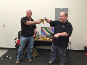 Greg (left) and William (right) going over a safety brief before beginning the instruction on disarm techniques.